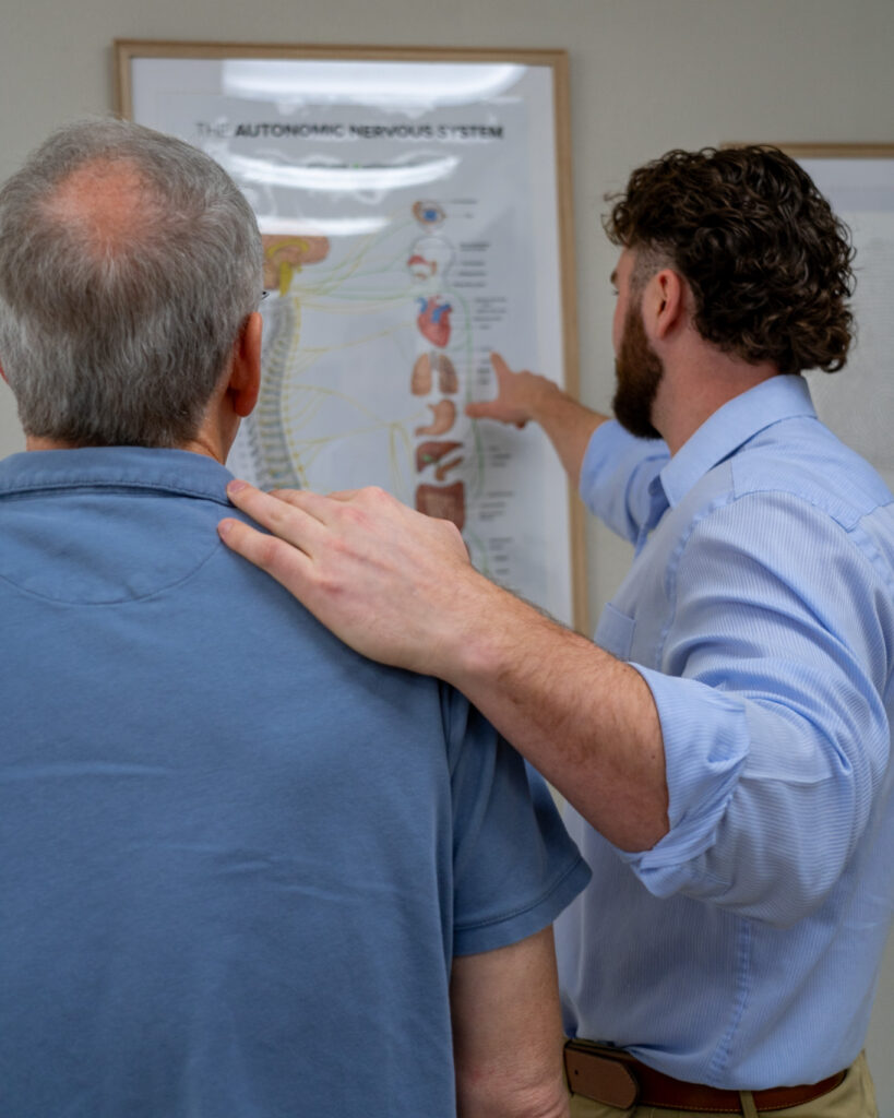 Doctor explaining health care plan with patient in plano tx